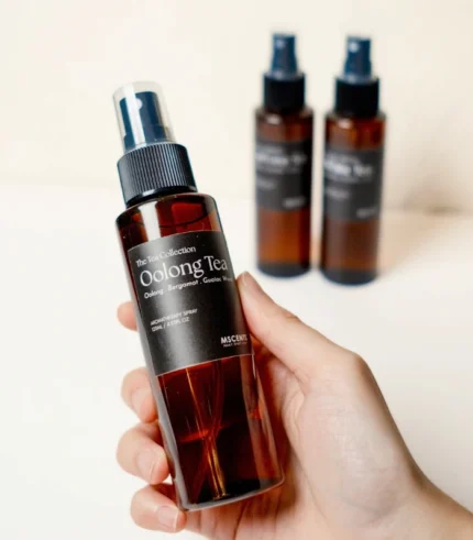 Hand Holding MScents Aroma Spray Oolong Tea