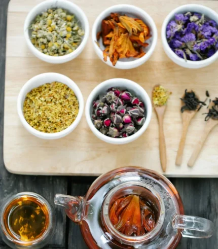 top view of assorted tea leaves in small bowls