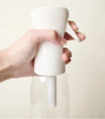 Hand Holding MScents Nano Spray Bottle