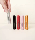 Hand Holding Matte Silver MScents Travel Perfume Atomiser