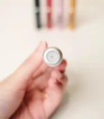 Hand Holding Matte Silver MScents Travel Perfume Atomiser Bottom