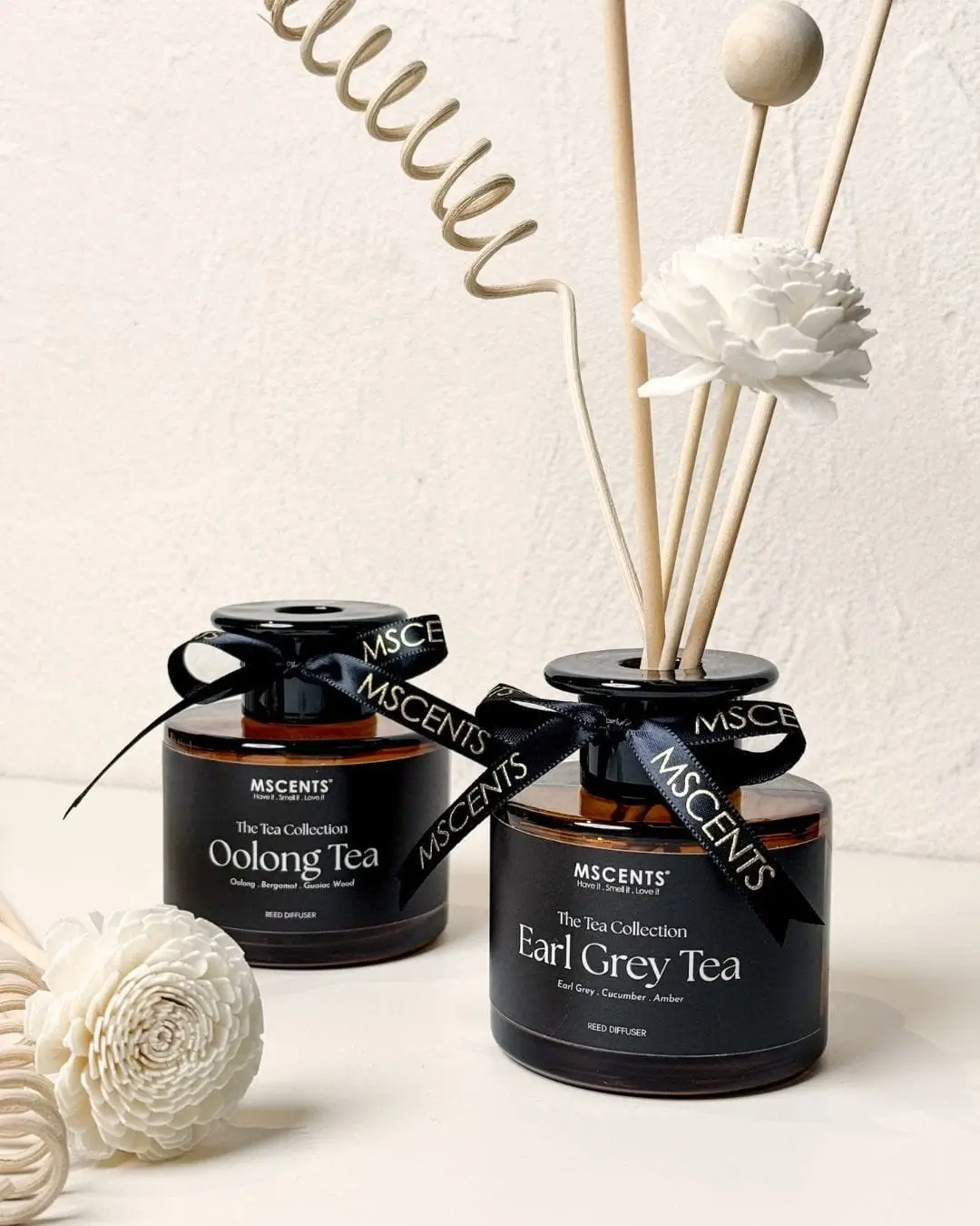 2 amber bottles of tea collection reed diffuser from MScents