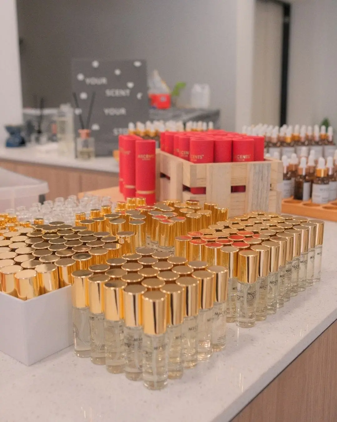 Batches of MScents eau de parfum sprays in various luxury scents