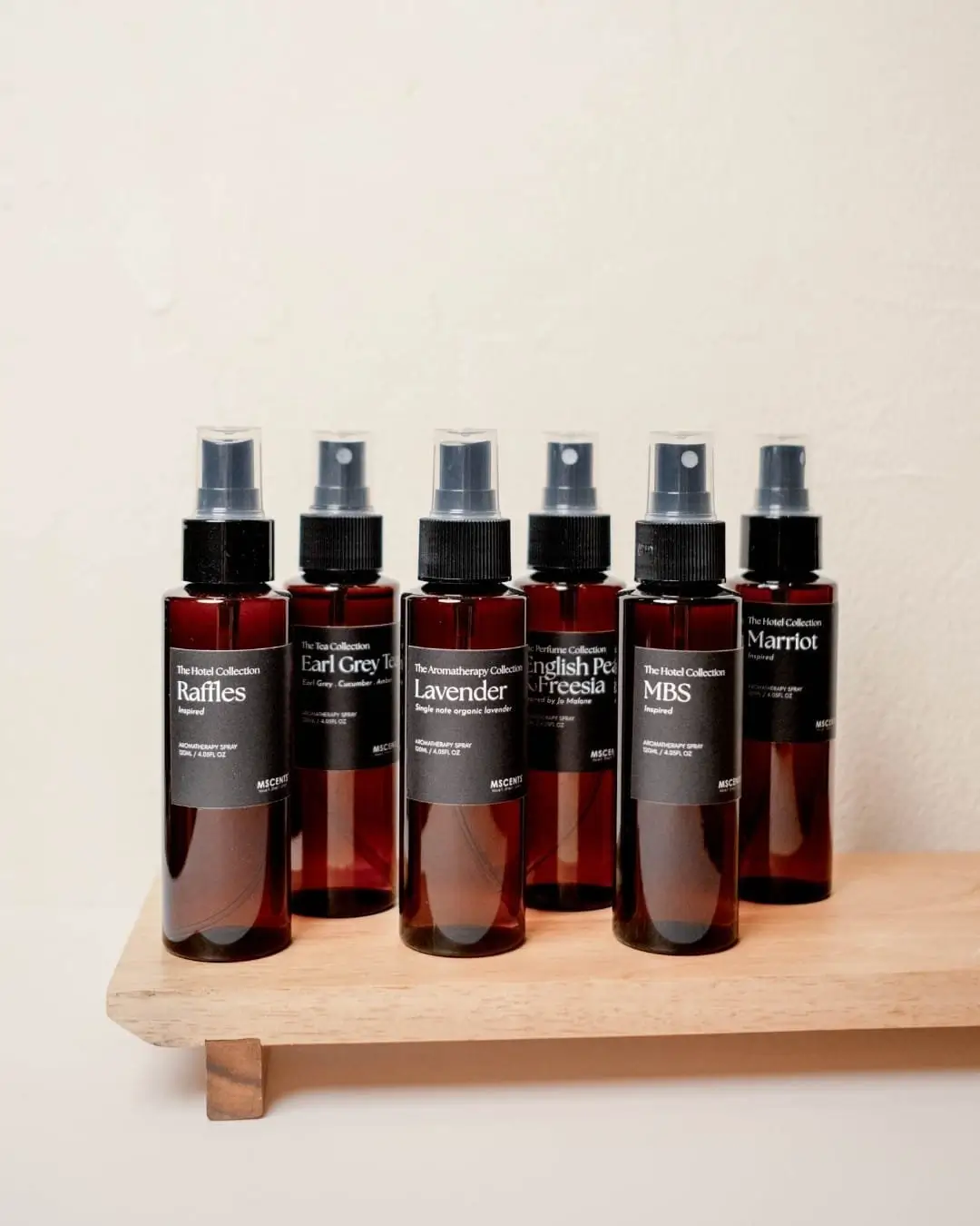 6 MScents aroma spray with various scents displayed on low table