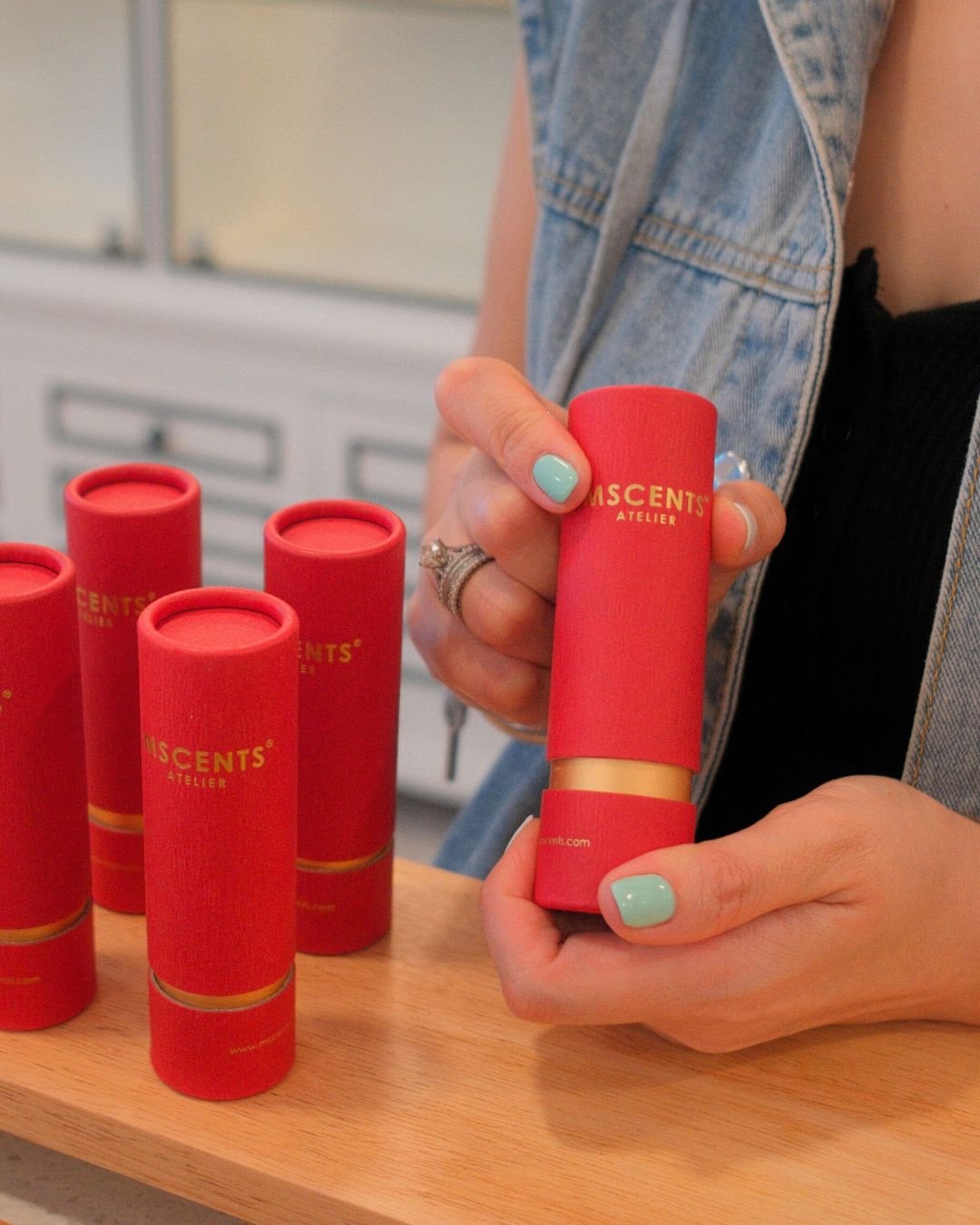 Mini perfume bottles in red packaging