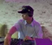 A professional DJ working in the DJ booth at an event